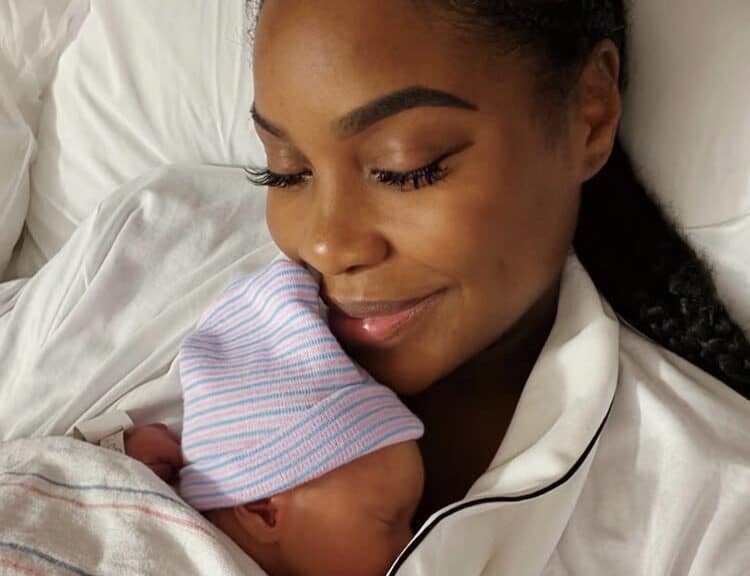 Lauren holding new baby